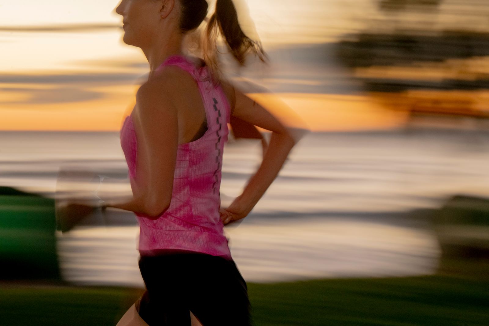 Energy gel tucked into runner shorts during a coastal run